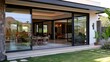 © Nicat - Home facade with sliding glass doors