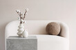 © kite_rin - View of modern scandinavian style interior with sofa and trendy vase, Home staging and minimalism concept