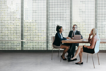 Wall Mural - Business people discussing in a meeting room