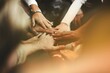© Rawpixel.com - Joined hands for teamwork, business concept