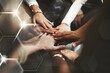 © Rawpixel.com - Joined hands for teamwork, business concept