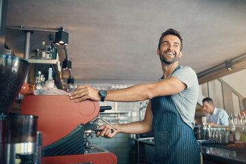 Poster - Man, smile and waiter with coffee machine at shop for customer service, pride and preparing order. Happy, barista and equipment with confidence for cafe hospitality, small business or drink in Brazil