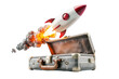 © Sodapeaw - Suitcase with a launching rocket, symbolizing travel, adventure, creativity, and innovative ideas. Perfect for business and technology themes.