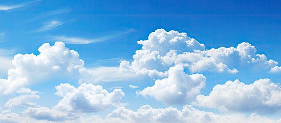 Sticker - Beautiful white clouds under blue sky background. Creative banner. Copyspace image