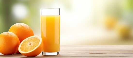 Aufkleber - Oranges and fresh squeezed orange juice close up on light wooden background. Creative banner. Copyspace image