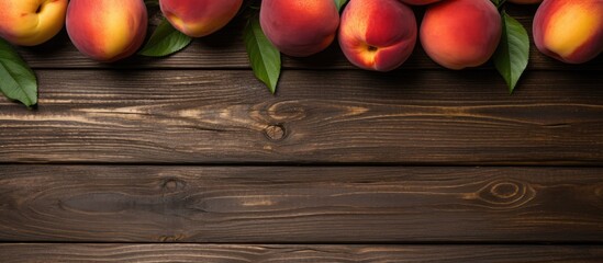 Poster - Fresh ripe peaches fruits on wooden rustic background Top view. Creative banner. Copyspace image