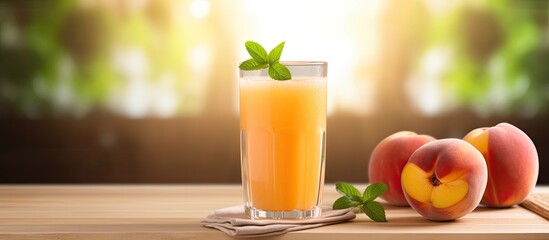 Poster - Fresh peach juice with mint on the wooden table selective focus. Creative banner. Copyspace image