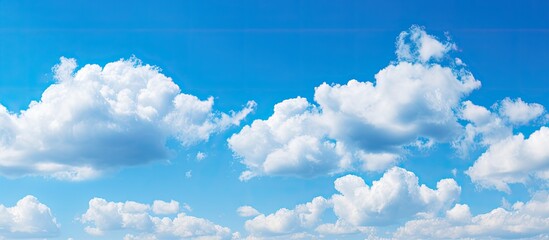 Poster - Blue sky with slight white clouds sunny day sky background. Creative banner. Copyspace image
