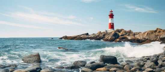 Poster - rocky coast and lighthouse against clear sea. Creative banner. Copyspace image