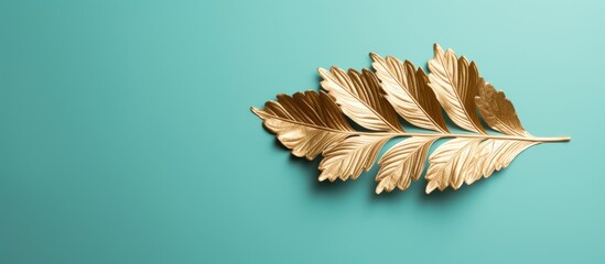 Aufkleber - Golden leaf on mint color background Top view Creative design elements for invitation wedding cards valentines day greeting cards Trendy green and turquoise color. Creative banner. Copyspace image