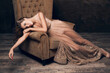 © mary_markevich - beautiful woman in evening dress sitting in chair, luxury glamour style