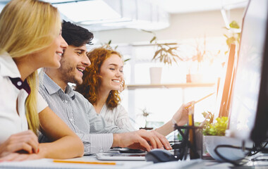Aufkleber - Young creative team discussing new marketing strategy, sitting together in office, empty space