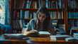 © standret - Young female student preparing for exams in a cozy library