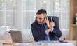 © SpaceOak - Businessman on Phone in Office