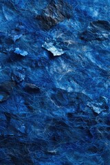 Poster - A detailed shot of a piece of blue fabric with intricate patterns and textures