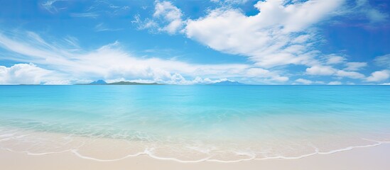 Poster - Sea sky rocks sandy beach beautiful clear water Sea water as far as the eye can see and beautiful nature ready for you to experience Come travel to the sea. Creative banner. Copyspace image
