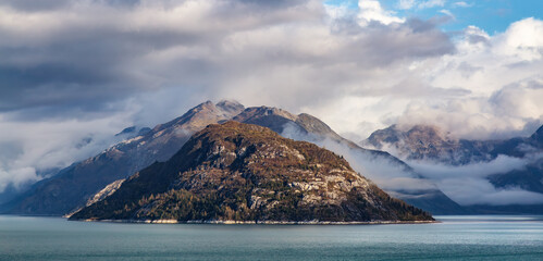 Wall Mural - Dramatic Cloudy Morning over Alaska Coast. Nature Background