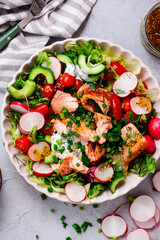 Canvas Print - Pulled salmon spring  vegetables salad. .top veiw.selective focus