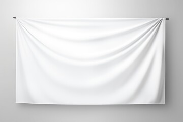 A simple white cloth hung on a wall, suitable for various interior designs and decorations