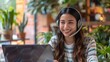 © Working Moments - - Hispanic contact center agent in headset enthusiastically assists customer.- Hispanic woman provides customer service on laptop at contact center