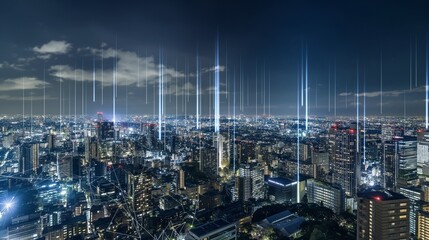Wall Mural - A panoramic view of a modern cityscape at night, with visible beams of light representing the invisible data connections between buildings.