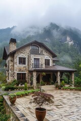 Wall Mural - A large stone house with a stone roof sits on a hillside