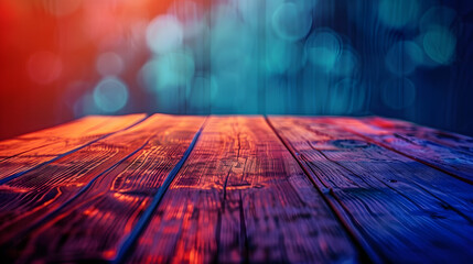 A wooden table with a blue and red background. The background is blurry and colorful