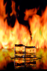 Wall Mural - fire and ice cubes on a black background, place under the text 2