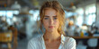 © Vertigo Images - Confident Young Businesswoman in Contemporary Office