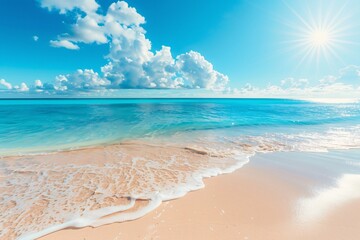 A tranquil beach scene with bright sunlight, clear blue sky, and gentle turquoise waves.