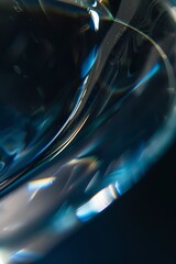 wallpaper of macro photo of clean polished glass and silver metall, edges with light from four different colors, depth of field, blurred, dark navy and dark azure, dark background, natural colors, 2:3