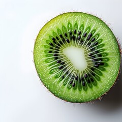 Sticker - Sliced Kiwi Fruit Revealing Its Bright Green Flesh and Tiny Black Seeds on White Background