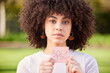 © peopleimages.com - Woman, portrait and paper for outdoor protest on gender equality, equal pay or fair opportunity. Feminism, placard and hand of female person for unfair financial compensation, income bias or sexism