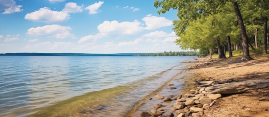 Wall Mural - Lake Eufaula in Oklahoma offers a stunning beachfront scenery with an abundance of picturesque beauty in the background ideal for a copy space image