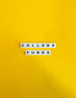 © photoopus - College Funds Term and Banner. Text on Block Letter Tiles on Flat Background with Copy Space. Minimal Aesthetics.