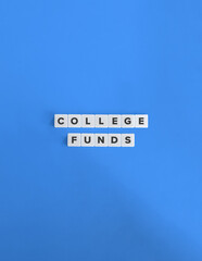 Wall Mural - College Funds Term and Banner. Text on Block Letter Tiles on Flat Background with Copy Space. Minimal Aesthetics.