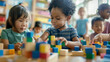 © VK Studio - Young children enthusiastically assembling colorful blocks in a lively and vibrant classroom, highlighting collaborative learning.