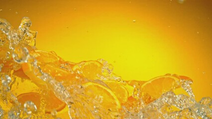 Aufkleber - Super Slow Motion of Flying Orange Slices with Water Splashes, Isolated on Colored Background. Filmed on High Speed Cinema Camera, 1000fps.