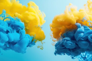 Wall Mural - two large clouds of colorful smoke, one blue and one yellow. the smoke is swirling and creating a dy