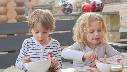 Poster - Children, kids, siblings, eating chocolate ice cream spring time