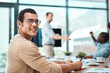 © DoneDeal/peopleimages.com - Portrait, business man and writing notes in office meeting for coworking in startup company. Face, financial analyst and happy professional entrepreneur on notebook with glasses for info or data