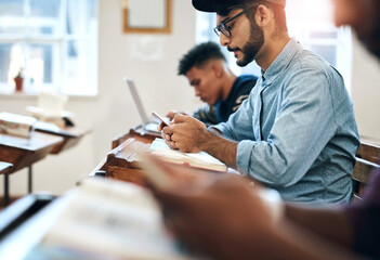 Canvas Print - Man, classroom and university with phone for research, reading message on mobile app at school. Male student, college or social media with education or learning, scroll for news story with internet