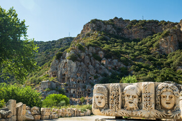 Wall Mural - Myra archaeological site in Demre, Turkey. The Ancient City of Myra is especially famous for its Lycian-Era rock tombs, Roman-Era theatre