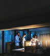 © peopleimages.com - Group, night and business people on computer for training or coaching on project deadline. Team, collaboration and discussion of strategy, brainstorming ideas and sales manager drink coffee in office