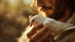 © Yin - Jesus Christ gently hold a white dove. Religion and Christianity concept