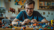 © Kafka - Exploring Kidult Phenomenon: Man in His 30s Enjoying Children's Toys in a Cute Hoodie