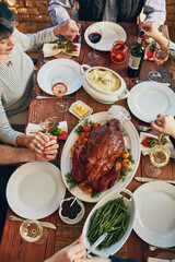 Wall Mural - Family, praying and food for thanksgiving, dinner and celebration outdoor with turkey, wine or love. Group of people, smile and together at table for holiday, event and gratitude with drink or eating