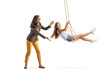 © Ljupco Smokovski - Woman pushing girl on a swing