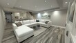 © Екатерина Чумаченко - A high-angle view of a recently renovated basement with contemporary design elements, including a large white sectional sofa and a gray-toned wood-look floor