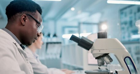 Poster - Scientist, black man and microscope or writing in laboratory for results on medical research and experiment. Notebook, professional and expert with notes on science development, study review and info